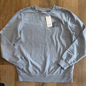 Light Blue Crewneck Sweatshirt with Subtle Wave Logo